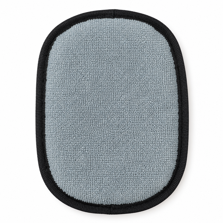 Textured fabric side of the black pet hair remover mitt